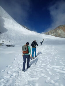 Trekkers approaching the Cho La pass in the Khumbu region of Nepal