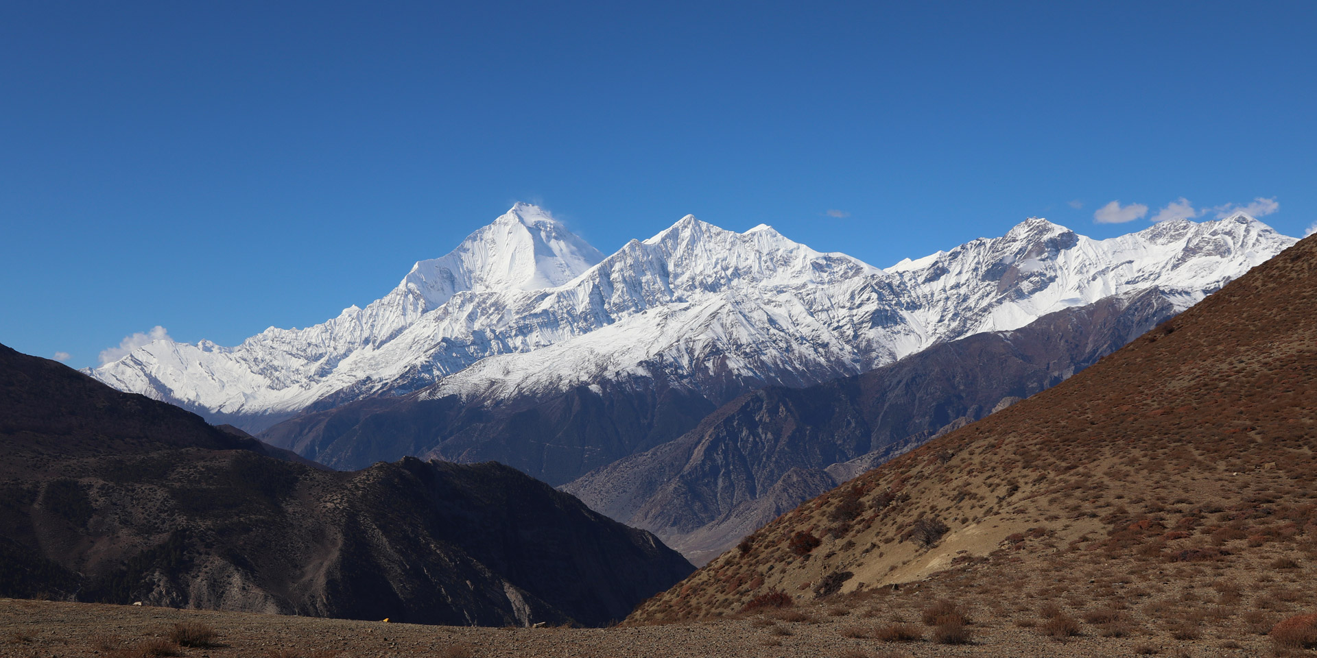 View of Dhaulagiri and Tukuche peaks from the trail to Lupra in the Mustang region of Nepal