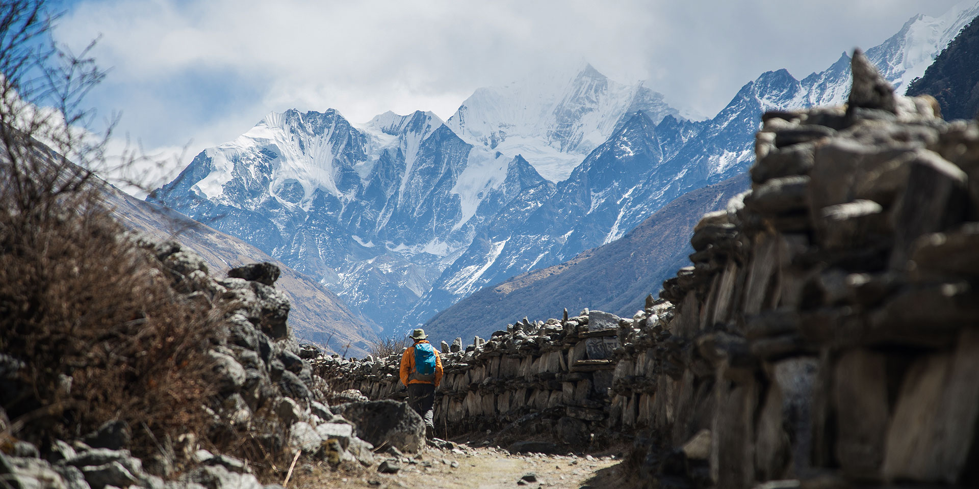 Great Mani (prayer) wall before Mundu trekking in the Langtang valley, Nepal