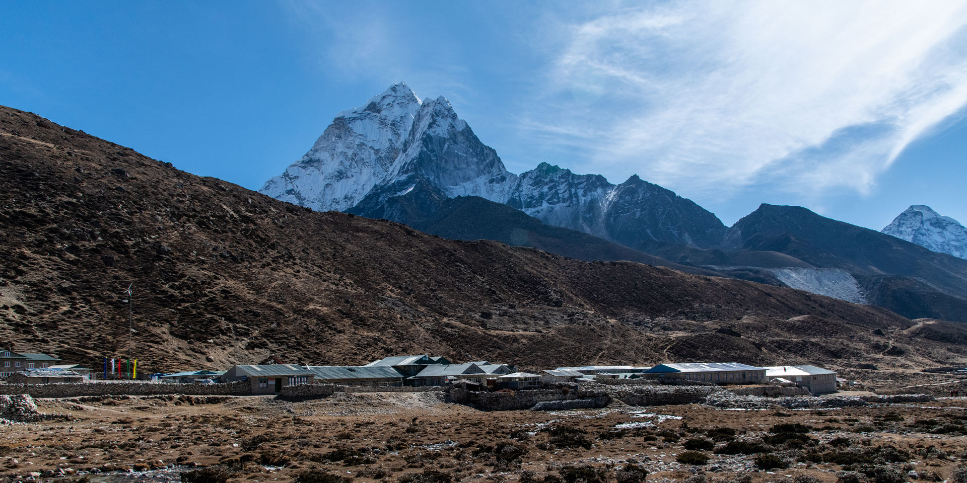 Ama Dablam towers over Periche village in the Khumbu region of Nepal