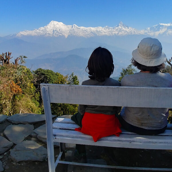 Trekkers enjoying the view of Dhaulagiri and the Annapurnas from Panchase top on the Panchase trek in Nepal