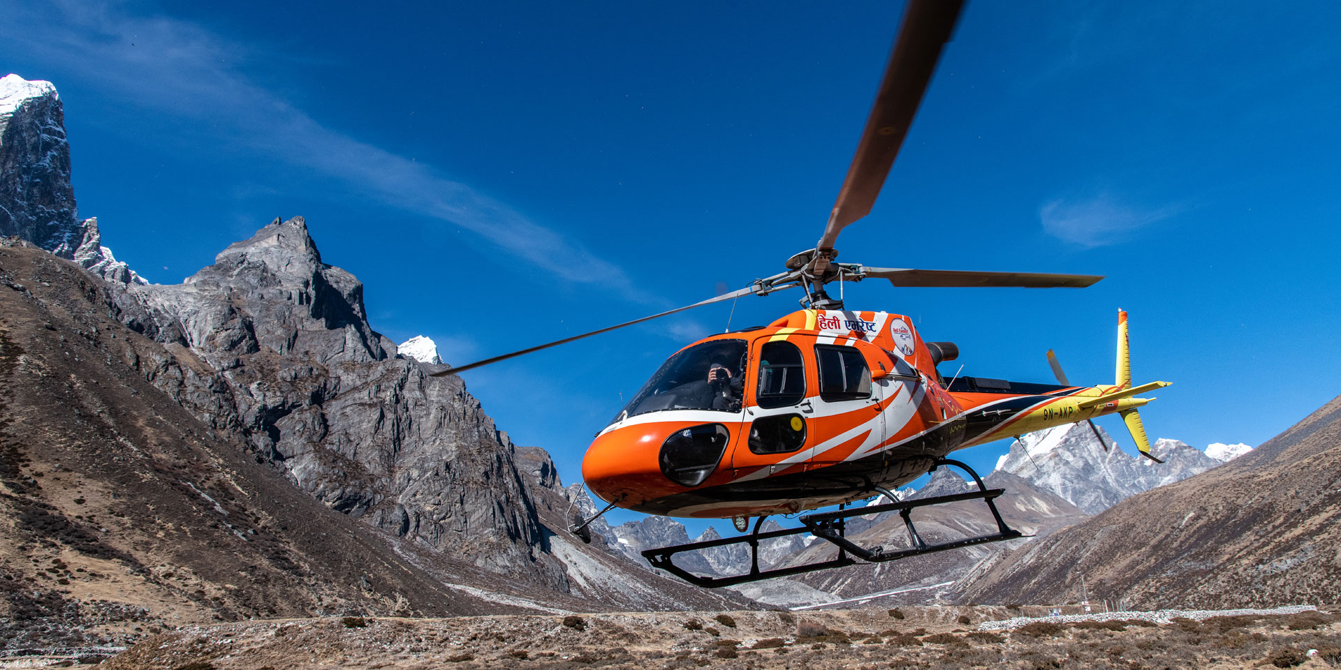 Helicopter takes off from Kalapattar in the Khumbu region of Nepal