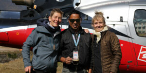 Happy clients with their pilot at breakfast time in the Khumbu region of Nepal