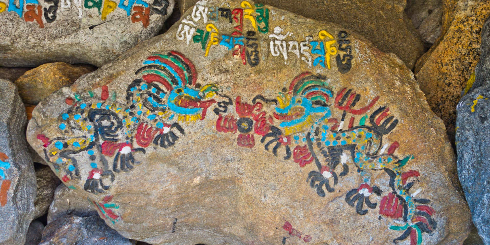 Dragons on a manu (Prayer) wall in Ghunsa on the Kanchenjunga trek in Nepal