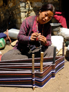 Traditional weaving at Yak Kharkha on the Begala La trail in lower Dolpo, Nepal